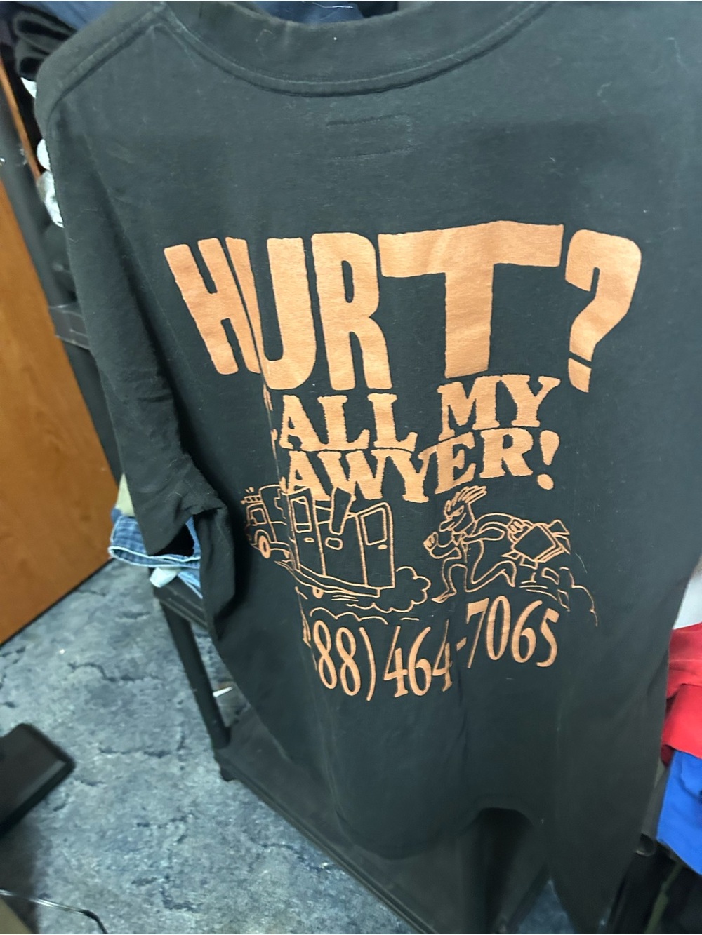 Hurt? Call My Lawyer! Graphic Short Sleeve Tee - Black/Orange